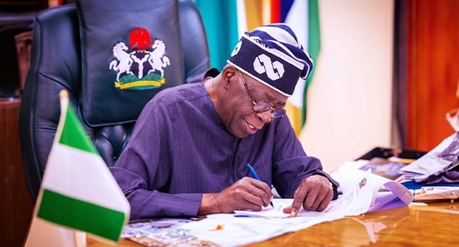 Tinubu_Signing_-1